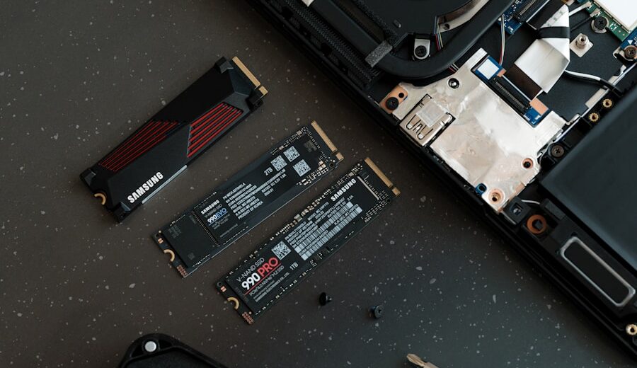 A broken laptop computer sitting on top of a table